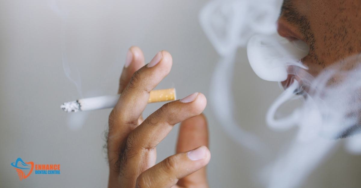 How does smoking affect oral cancer risk