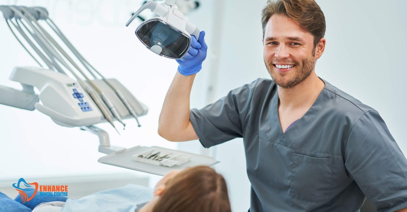 Dentist reviewing x-rays and 3D scans with a patient during the consultation for the All-on-4 dental implant procedure