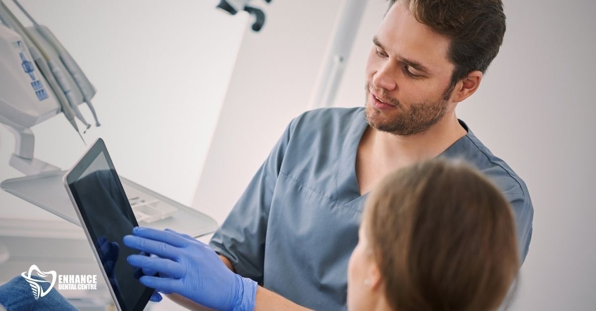 A dentist consulting with a patient