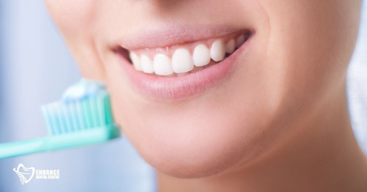 Person brushing teeth
