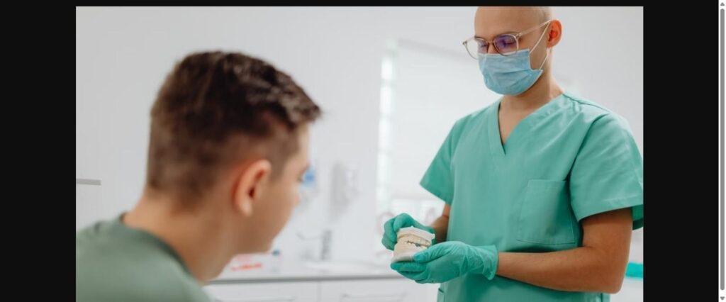 Dentist explaining dental care coverage to a patient at a Vancouver clinic